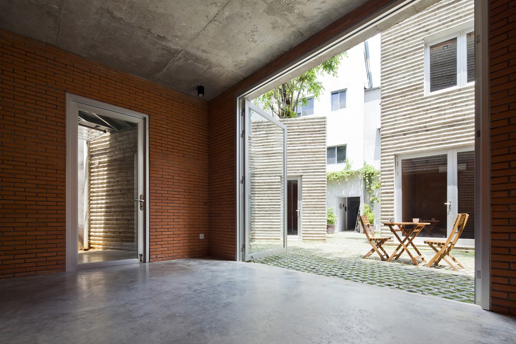 53a364acc07a80fed500029a_house-for-trees-vo-trong-nghia-architects_09_dining_room